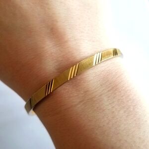 Vintage Monet bangle bracelet gold tone diagonal diamond cut textured
